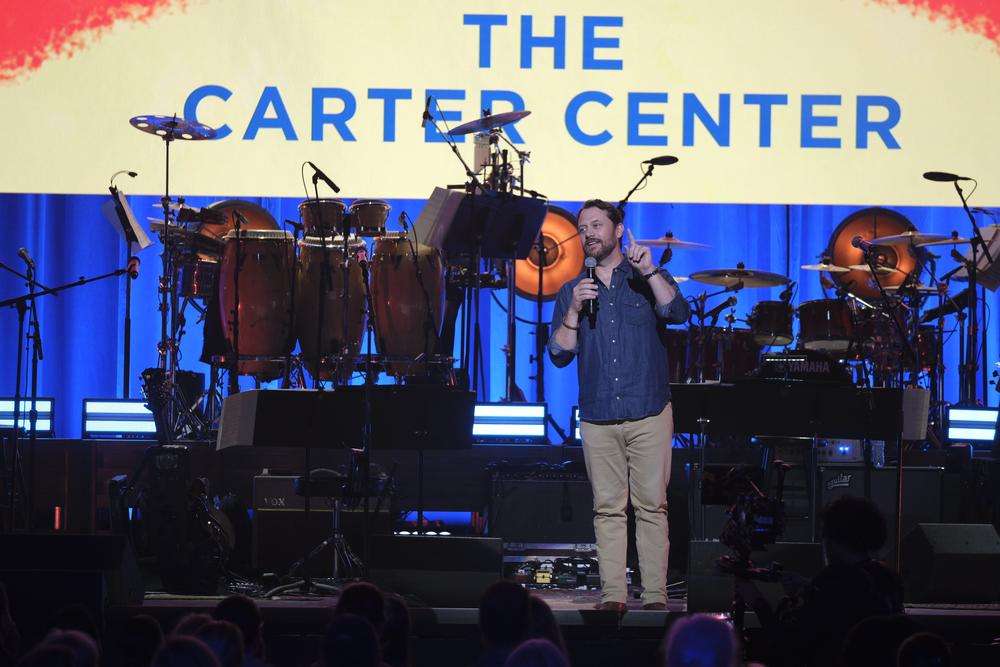 Jason Carter, grandson of Jimmy Carter, speaking at the “Jimmy Carter 100: A Celebration in Song,” celebration. Photo by Rick Diamond/The Carter Center