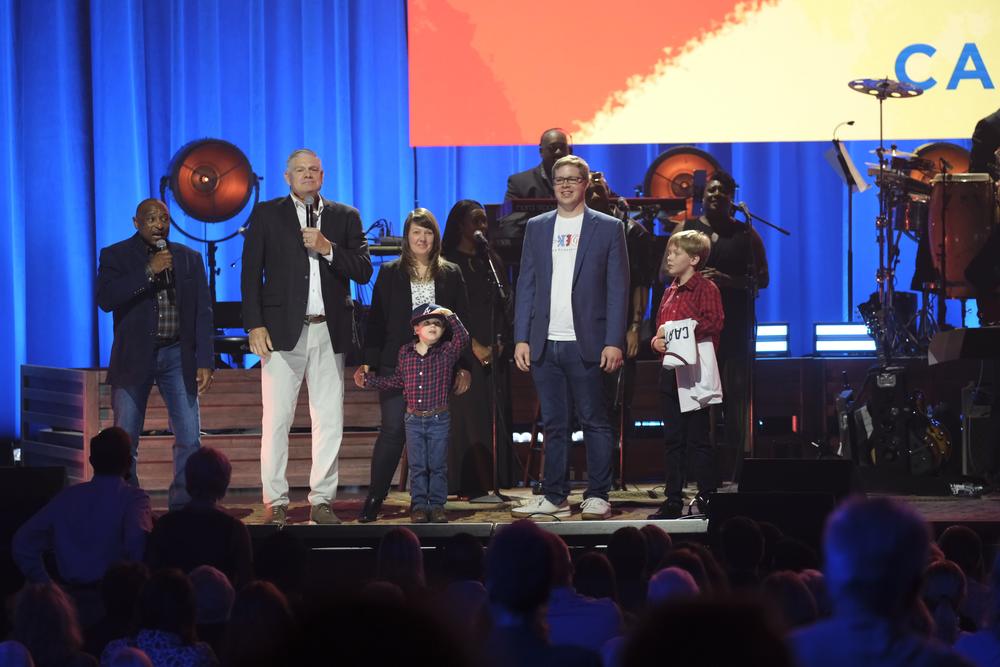 From left to right, former Atlanta Braves players Terry Pendleton and Dale Murphy joined by Josh Carter at the “Jimmy Carter 100: A Celebration in Song,” celebration. Photo by Rick Diamond/The Carter Center