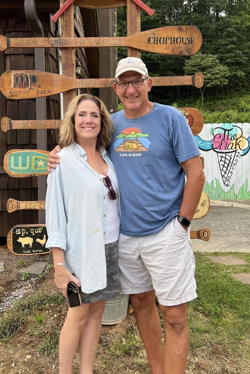 David Phenix is shown in casual dress, his right arm around Leesa Wells Phenix, in this photo taken from his Facebook page.