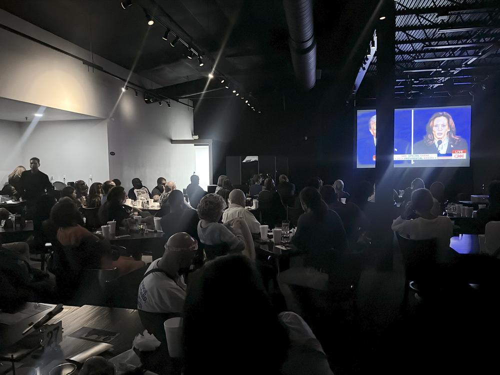 Democrats in Cobb County gathered at The Perfect Note Tuesday to watch the debate and cheer on Vice President Harris on Sept. 10, 2024.