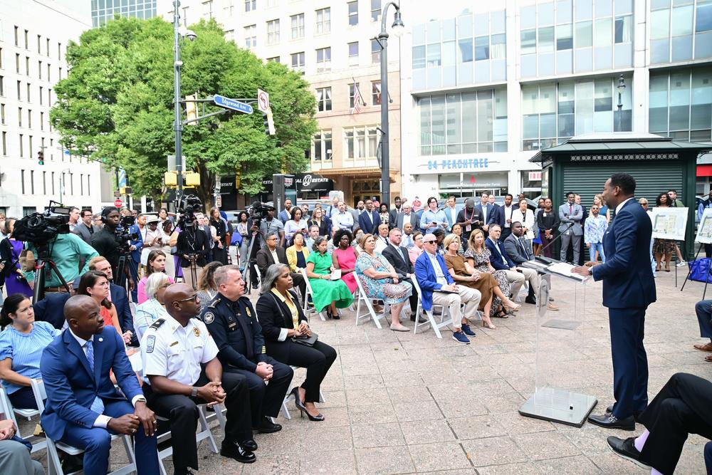 Mayor Andre Dickens speaks at an event in Woodruff Park in September 2024