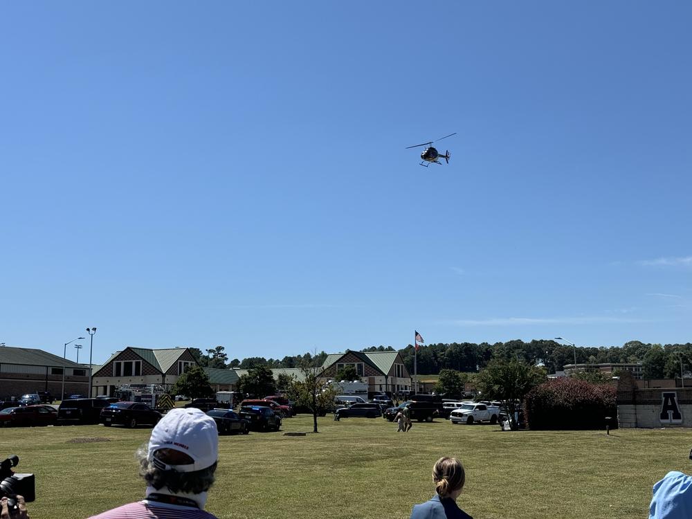 A Life Flight air medical ambulance seen leaving the scene of the Apalachee High School campus. Chase McGee/GPB News