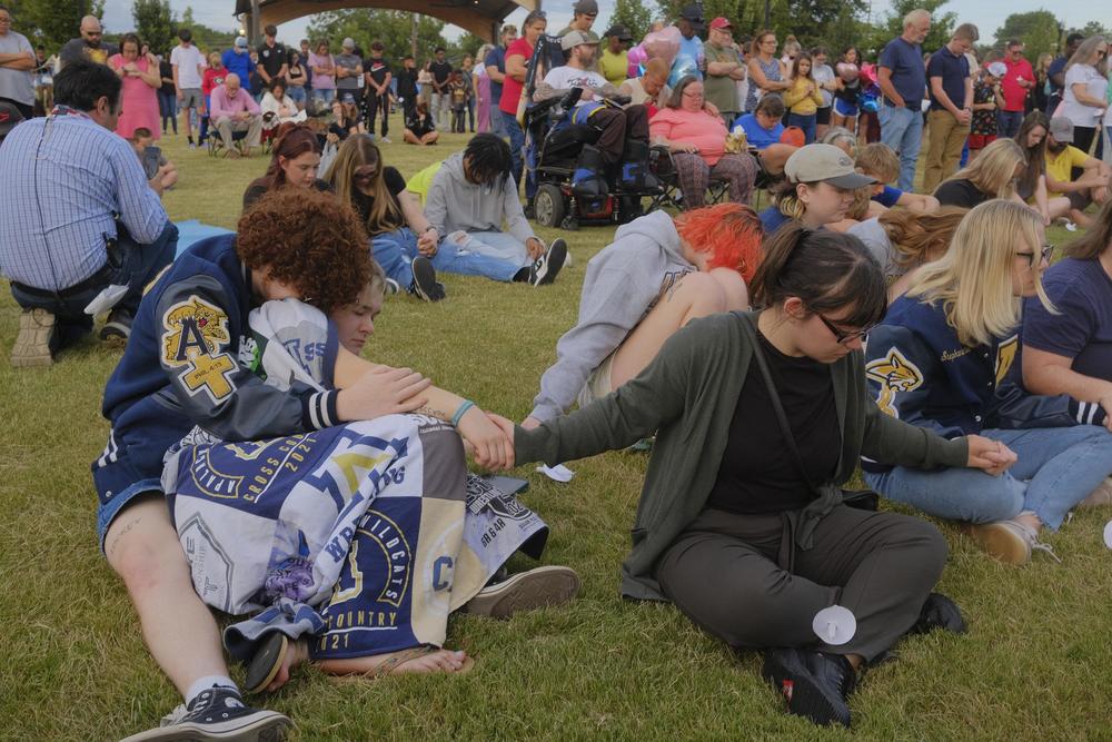 Apalachee High School students and people from the broader Barrow County community gathered for a prayer vigil in a city park after the shooting deaths of four at the school Wednesday. Grant Blankenship/GPB News