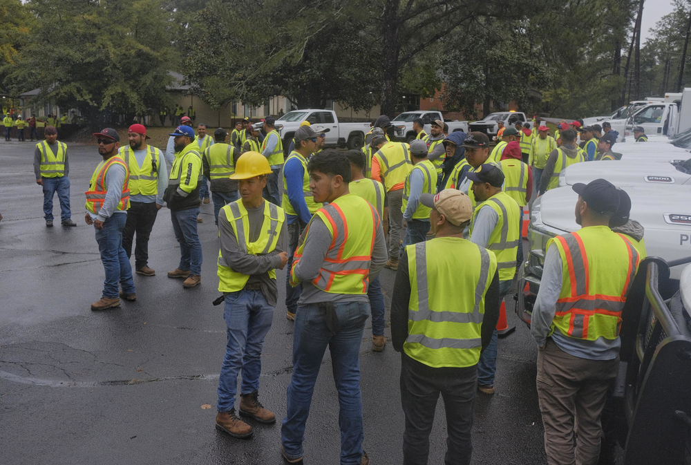 Memphis, Tennessee tree service workers in Macon, Georgia. Grant Blankenship/GPB News