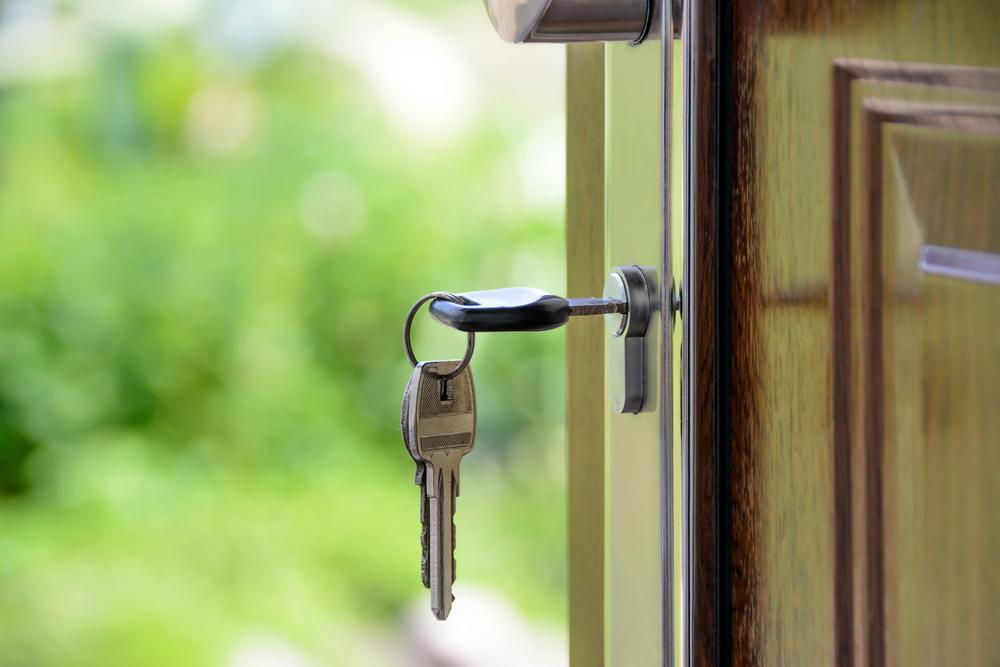 Black Handled Key on Key Hole. Pexels