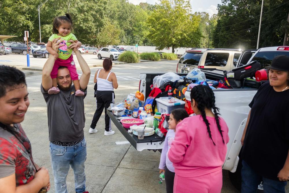 The Baena-Martinez family of Tampa stopped at a Macon, Ga., rest area to share a late lunch on Oct. 8, 2024.