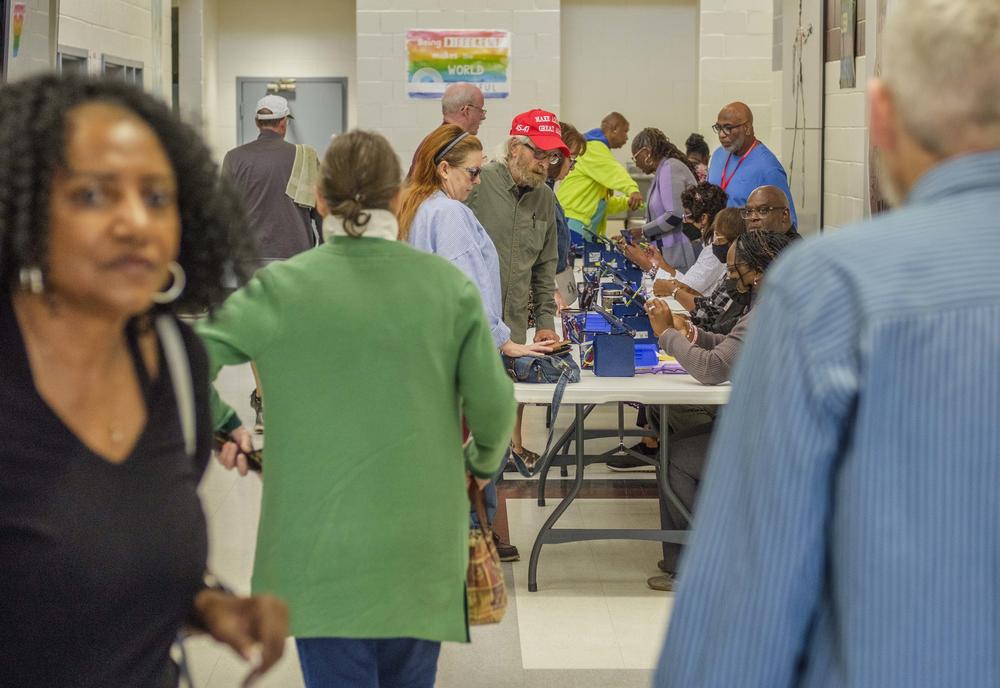 The line to get checked into the polls at the Theron Ussery Community Center in Macon on the first day of early voting in the 2024 general election.