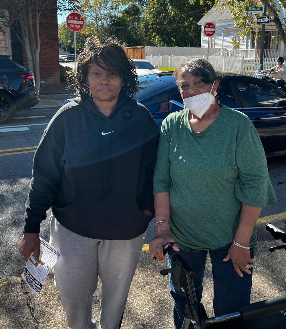 Conyers residents Jane Sadler and Barbara Baker participate in an October 19 protest in Olde Town