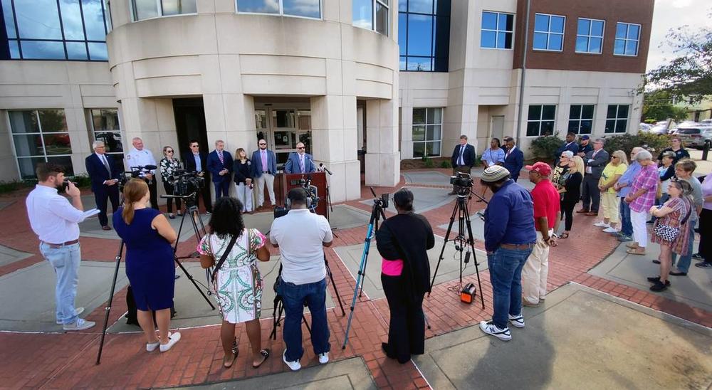 Deputy Chief Lance Deaton of the Columbus Police Department, at podium, speaks during a Tuesday afternoon press conference about Columbus Animal Care & Control. 10/01/2024 Mike Haskey mhaskey@ledger-enquirer.com 