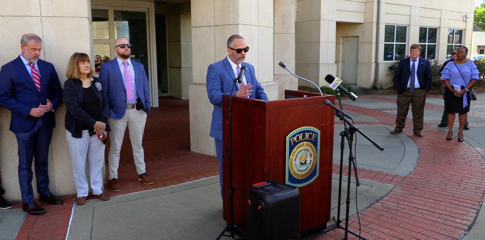 Deputy Chief Lance Deaton of the Columbus Police Department, at podium, speaks during a Tuesday afternoon press conference about Columbus Animal Care & Control. 10/01/2024 Mike Haskey mhaskey@ledger-enquirer.com  