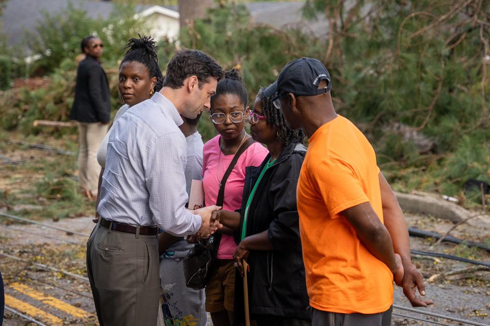 Georgia U.S. Senator Jon Ossoff pictured greeting a family during an Oct. 2 trip to Augusta to meet and distribute food to families affected by Hurricane Helene. Ossoff's Office/X