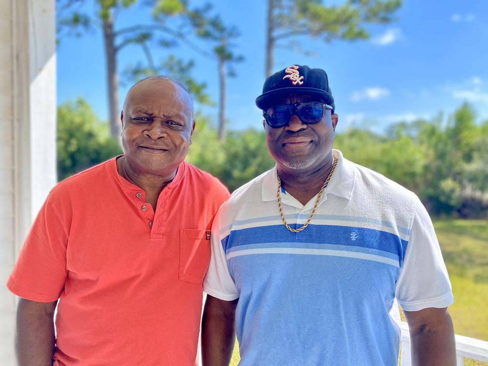 Cousins Richard Banks and James Banks outside the Sapelo Island Cultural and Revitalization Society.