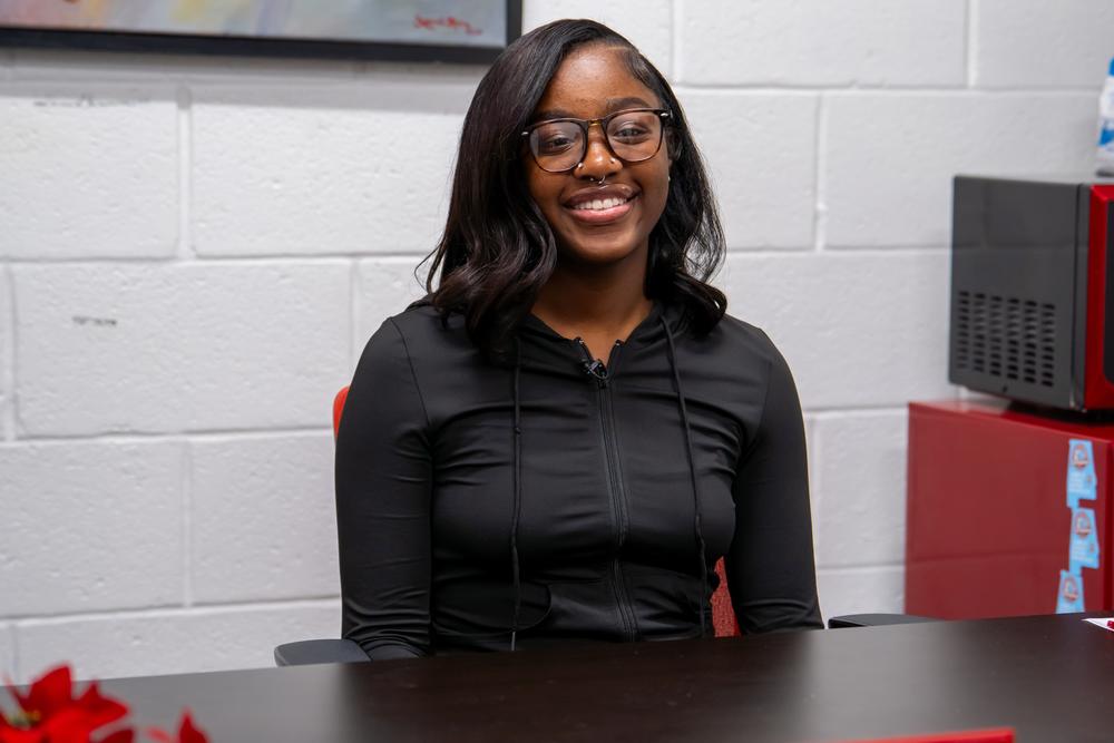 Allison Maxwell, senior and piccolo player, sits for an interview with GPB News.