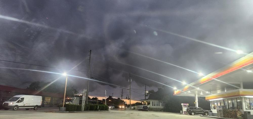 Thick smoke over a nearby gas station in Conyers, Georgia, on September 29 as a chemical fire at the nearby BioLab facility prompts evacuations and raises health concerns among residents