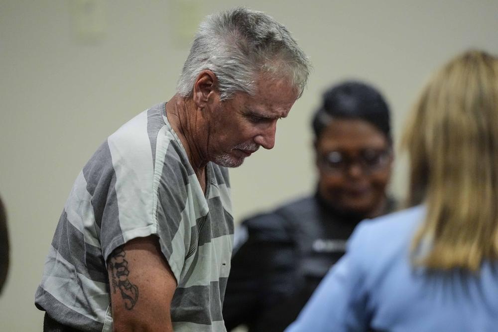 Colin Gray, the father of Apalachee High School shooter Colt Gray, enters the Barrow County courthouse for his first appearance, Sept. 6, 2024, in Winder, Ga.