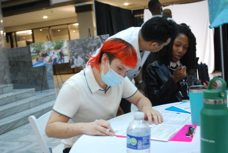  Harvey Yeager fills out a passport application form. Ross Williams/Georgia Recorder