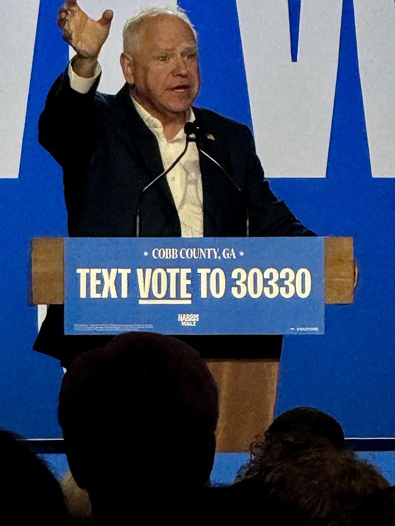 Minnesota governor and vice presidential candidate Tim Walz speaks to the crowd at the Cobb Galleria on Nov. 3, 2024.