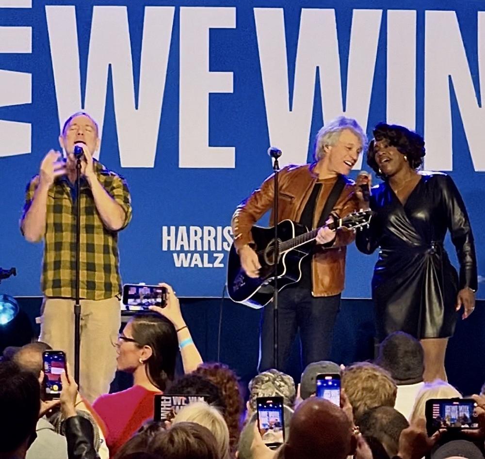 Michael Stipe of R.E.M. (left) performs with Jon Bon Jovi (center) and Tanya Blount Trotter of The War and Treaty at the Cobb Galleria on Nov. 3, 2024.