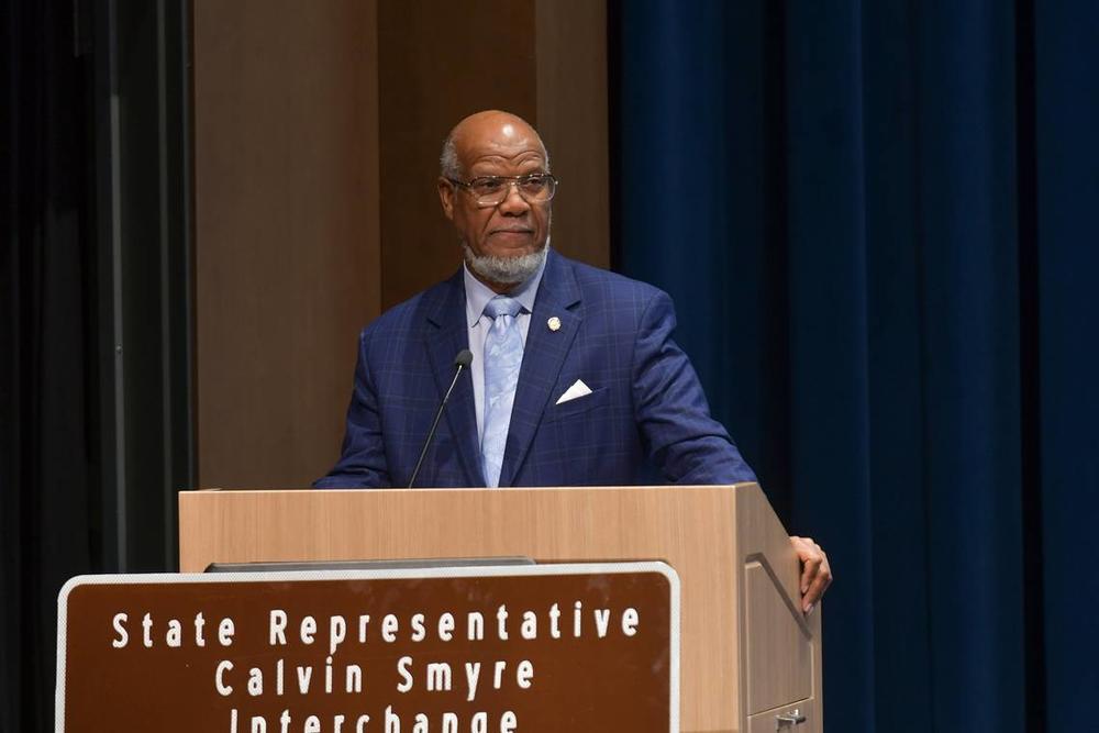 Former state Rep. Calvin Smyre of Columbus speaks in the Rainey-McCullers School of the Arts auditorium Dec. 18, 2024, during the ceremony celebrating the naming of the intersection of I-185 and Macon Road as the Calvin Smyre Interchange. Darrell Roaden Special to the Ledger-Enquirer