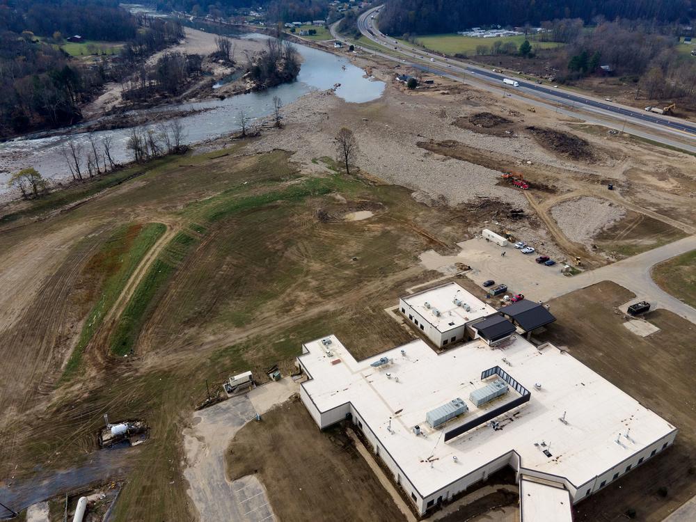 On Sept. 27, when Hurricane Helene hit the Southern Appalachians, rain from higher altitudes transformed the river into a deadly flash flood, ripping a path of destruction through Erwin. The flood claimed lives, leveled homes and businesses, and forced an emergency helicopter evacuation of Unicoi County Hospital, which opened next to the river in 2018. Maddy Alewine / KFF HEALTH NEWS