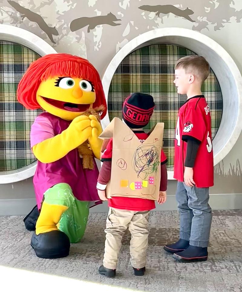 These brothers loved meeting Julia of "Sesame Street".