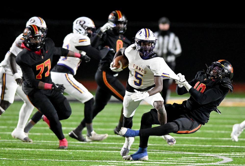 Northeast linebacker Santana Balkcom (10) takes down Fitzgerald’s Cam Johnson during the Raiders’ 46-14 win over Purple Hurricanes in Friday night’s GHSA state semifinal game. Jason Vorhees / The Melody