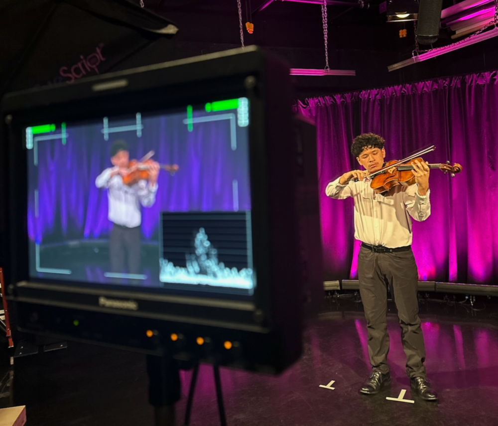 student playing viola