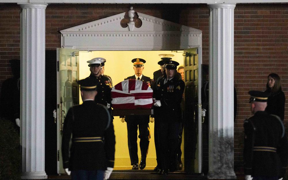 A military honor guard carries the casket carrying former President Jimmy Carter out of his home church Maranatha Baptist Church in Plains, Ga. after his final funeral Thursday January 9, 2025.