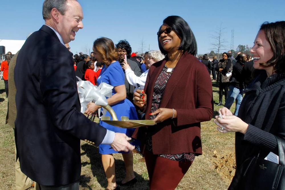 ROBIN TRIMARCHI rtrimarchi@ledger-enquirer.com. Muscogee County School District Superintendent David Lewis holds a ceremonial shovel for Georgia Rep. Carolyn Hugley, center, and MCSD school board member Shannon Smallman, right, to sign following groundbreaking ceremony for the new Rainey-McCullers School of the Arts in Columbus in 2016. ROBIN TRIMARCHI rtrimarchi@ledger-enquirer.com 