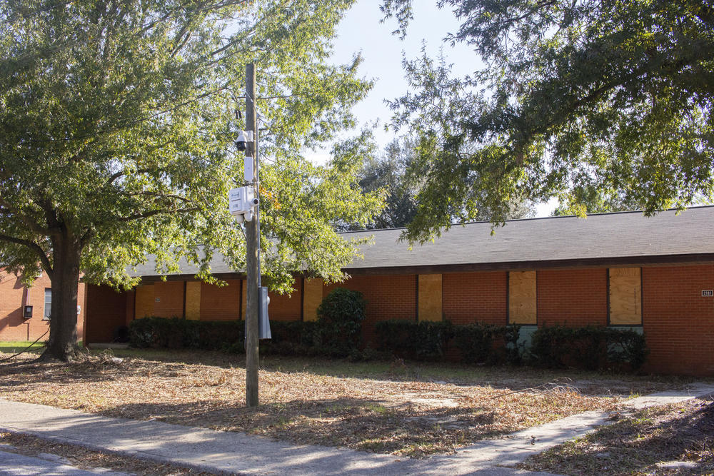 A security camera in front of a boarded up duplex at the Dogwood Terrace public housing complex in Augusta. The city's housing authority is moving forward with a years-long plans to demolish the neighborhood's old apartment buildings.