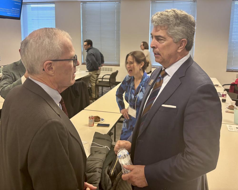 (left to right) Richard T. Griffiths, president emeritus of the Georgia First Amendment Foundation, speaks with Georgia Supreme Court Justice Michael P. Boggs at Feb. 21’s Georgia Bar, Media and Judiciary Conference. Stanley Dunlap/Georgia Recorder