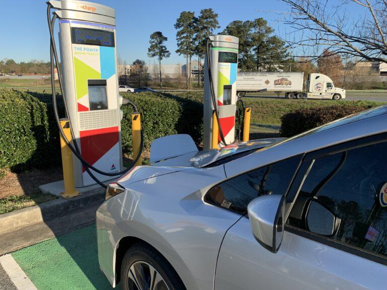 An electric car is being charged at a Georgia Power-owned fast-charging station in a Burger King parking lot in Columbus. The Georgia Power-set rate was 25 cents for every minute of charging. Jill Nolin/Georgia Recorder