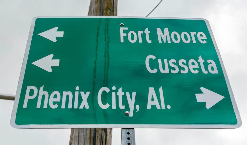 This road sign on Veterans Parkway in Columbus, near the intersection with Victory Drive, is among those that will need to be changed, now that Fort Moore has been renamed back to Fort Benning. 03/05/2025 Mike Haskey mhaskey@ledger-enquirer.com