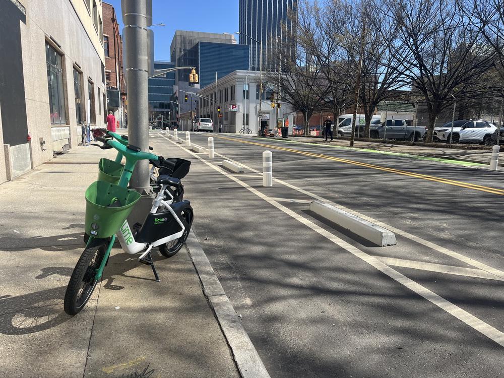 Upgrades to the bike lane on Forsyth street include new pavement and protections separating cyclists from car traffic. 