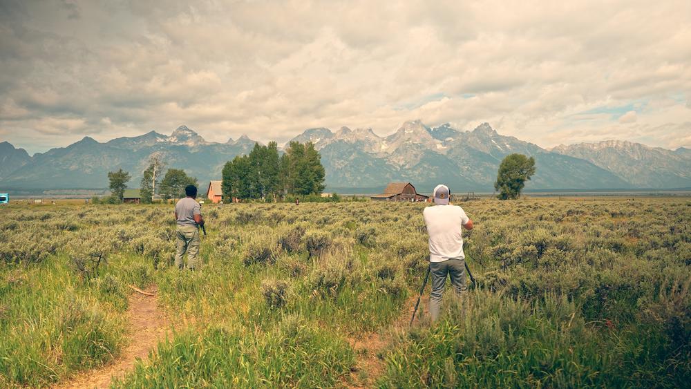 Hosts Paul Daniel (left) and Chris Greer photographing a mountain