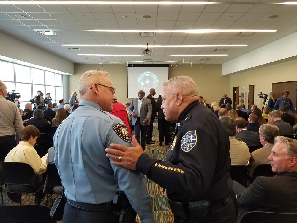 Chatham County Police Chief Jeffrey Hadley (left) greets Savannah-Chatham Police Chief Jack Lumpkin prior to Hadley's swearing in ceremony. The county and city departments will split Feb. 1.