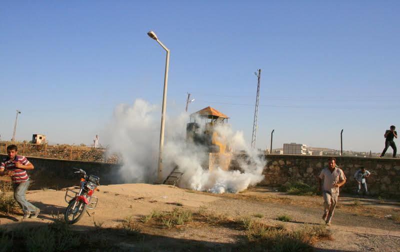 Running from tear gas, the Turkish military started shooting at Elizabeth Chappell and others, sending them back inside Turkey.