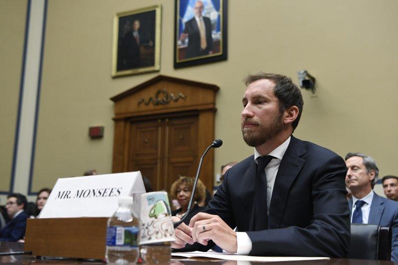 In this July 25, 2019, file photo, Juul Labs co-founder and Chief Product Officer James Monsees testifies before a House Oversight and Government Reform subcommittee on Capitol Hill in Washington, during a hearing on the youth nicotine epidemic. Vaping giant Juul Labs has donated thousands of dollars to court state attorneys general. But the lobbying strategy may be backfiring.