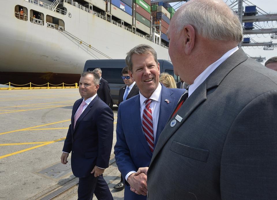 Gov. Brian Kemp, center, greets Savannah Economic Development Authority Board Chairman Kevin Jackson, right, Wednesday, April 24, 2019 to announce Plastic Express will expand operations in Pooler. (Left) Plastic Express President Ray Hufnagel.