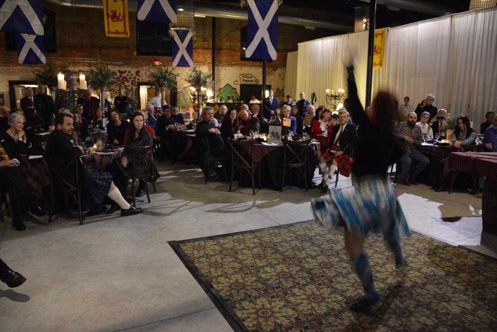 A Highland dancer performs for the well-fed Burns Supper crowd.