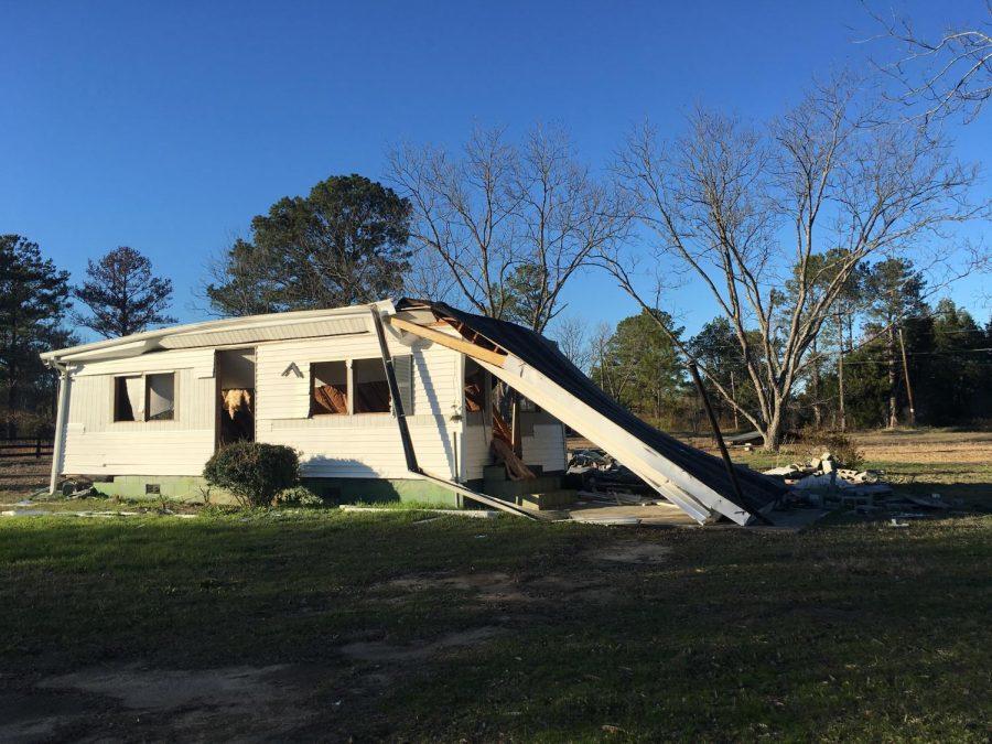A south Bibb County home sits dismantled at the corner of Kearnes and McArrell drives where Georgia Power will begin building a 650-acre solar farm in 2020. 