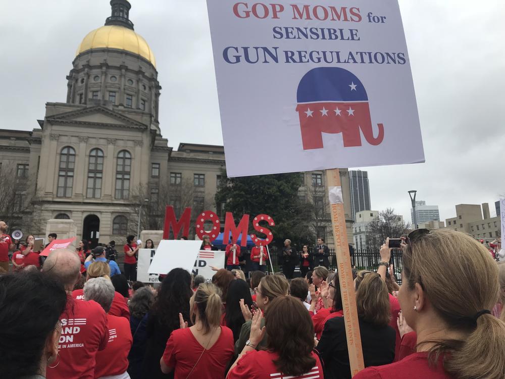 People gather at the Georgia Capitol on Wednesday to advocate for gun safety laws. 