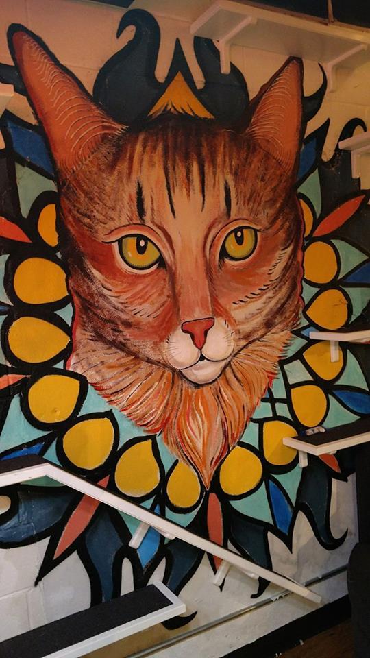 A large cat painting at Java Cats CafÃ© in Atlanta.