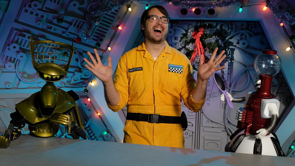 Robots Crow and Tom Servo and their human Jonah Ray in the new Mystery Science Theater 3000 on Netflix.