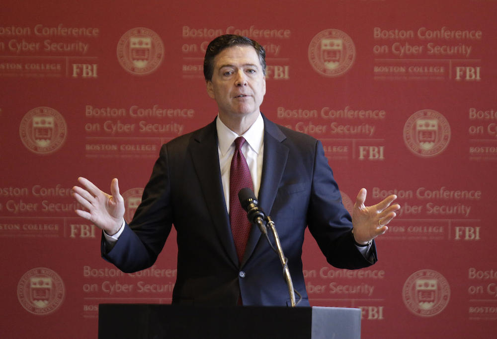FBI Director James B. Comey gestures as he delivers an address on cyber security at the first Boston Conference of Cyber Security at Boston College Wednesday, March 8, 2017, in Boston. 