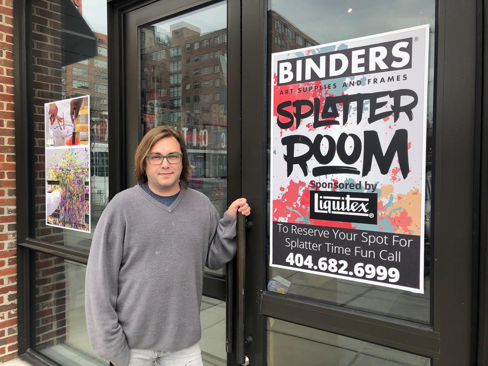 Binders' creative and marketing director Jade Bleclic stands outside the 'Splatter Room,' which he calls his "brain child."