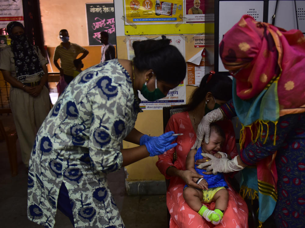 Medical staff in Mumbai, India,  last week. A U.N. report warns that the coronavirus pandemic is interfering with children getting vaccinated.