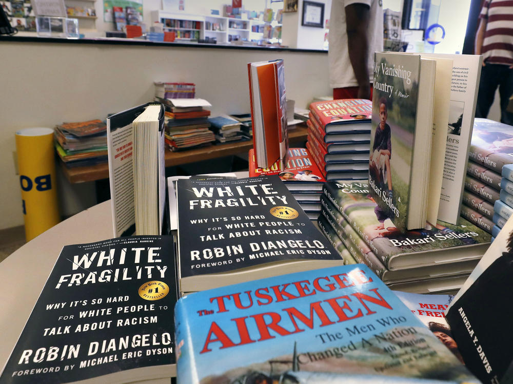 <em>White Fragility</em> on display in June at the Frugal Bookstore in Boston. John McWhorter says the book is condescending toward Black people.