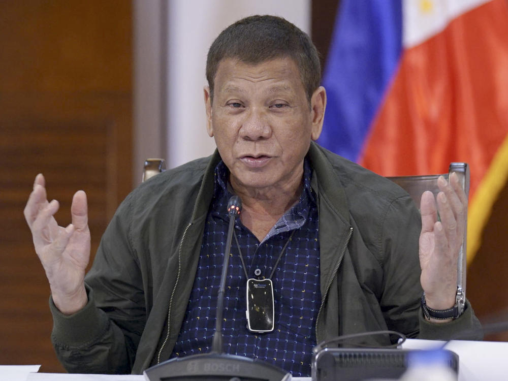 Philippine President Rodrigo Duterte discusses issues related to the new coronavirus during a meeting with an infectious disease task force at the presidential guest house in Panacan, Davao City, southern Philippines, on July 7.