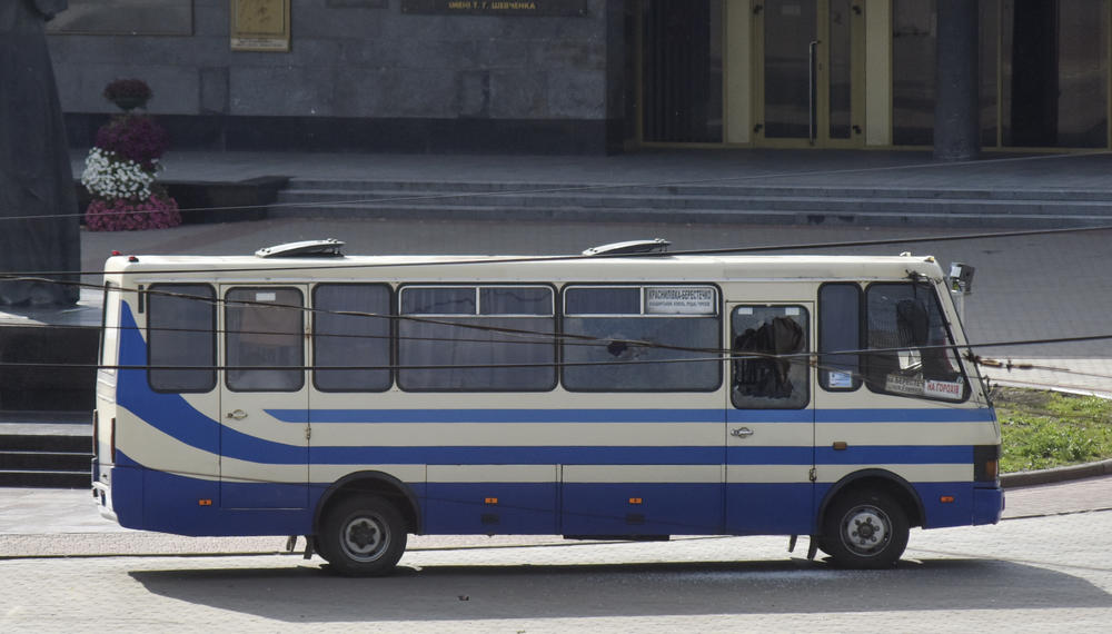 A gunman seized this bus and took 13 hostages in the city center of Lutsk, some 250 miles west of Kyiv, Ukraine, on Tuesday.